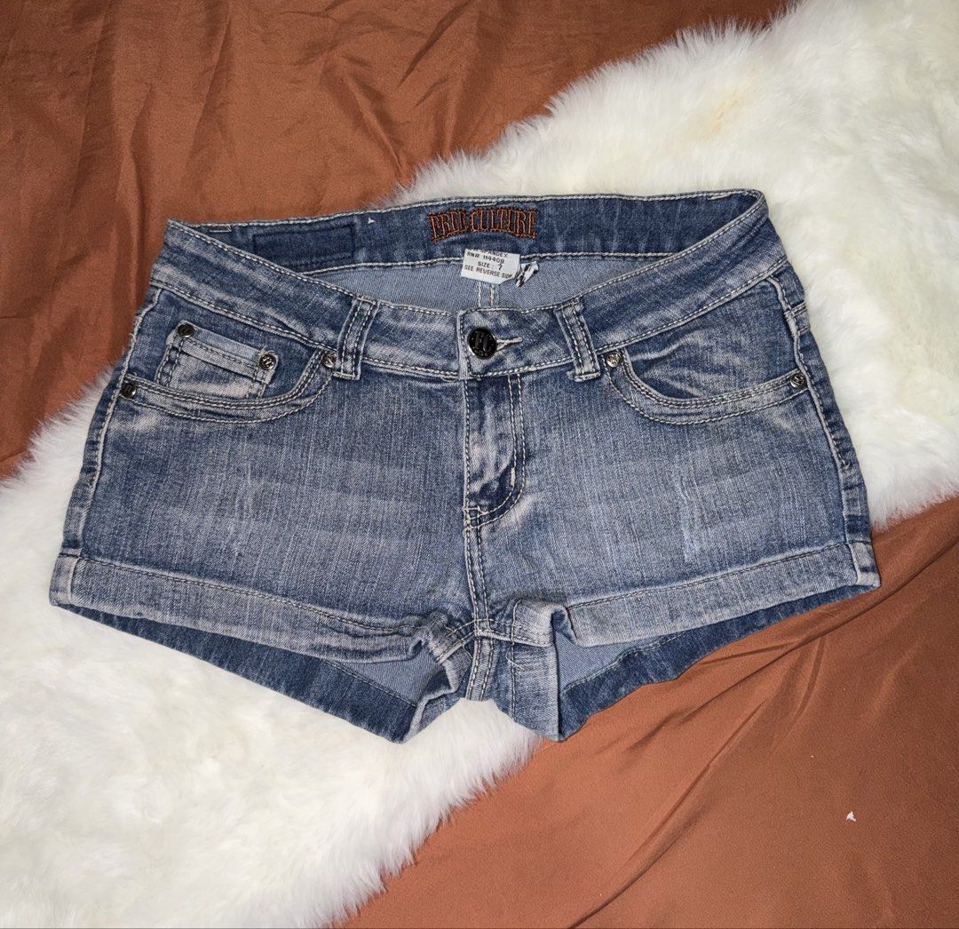 True Religion Denim Shorts (Category: Shorts) located in Manila. Submitted by maureenn10 (Listing ID 1463575030, Image 1). Description: - Brand: True Religion - Style: Blue denim shorts - Wash: Light wash - Features: Distressing, cuffed hem - Closure: Button and zip - Pockets: Front and back - Occasion: Casual wear.