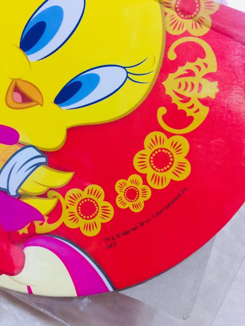 Tweety Bird Pot Mat - Warner Bros. Entertainment Inc. (Category: Character Goods) located in Baguio. Submitted by izza_thrifty (Listing ID 1463663413, Image 2). Description: - Cute Tweety Bird pot mat - Red and yellow design with floral accents - Made from durable cork material - Excellent for protecting your tables and countertops - Perfect gift for Looney Tunes fans - Item No. TC89103 - Licensed by The True Company.