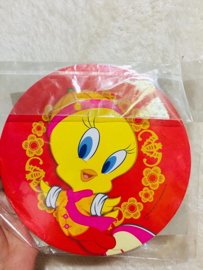 Tweety Bird Pot Mat - Warner Bros. Entertainment Inc. (Category: Character Goods) located in Baguio. Submitted by izza_thrifty (Listing ID 1463663413, Image 1). Description: - Cute Tweety Bird pot mat - Red and yellow design with floral accents - Made from durable cork material - Excellent for protecting your tables and countertops - Perfect gift for Looney Tunes fans - Item No. TC89103 - Licensed by The True Company.