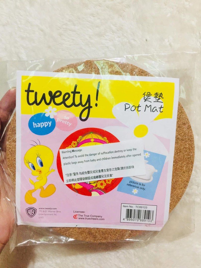 Tweety Bird Pot Mat - Warner Bros. Entertainment Inc. (Category: Character Goods) located in Baguio. Submitted by izza_thrifty (Listing ID 1463663413, Image 3). Description: - Cute Tweety Bird pot mat - Red and yellow design with floral accents - Made from durable cork material - Excellent for protecting your tables and countertops - Perfect gift for Looney Tunes fans - Item No. TC89103 - Licensed by The True Company.