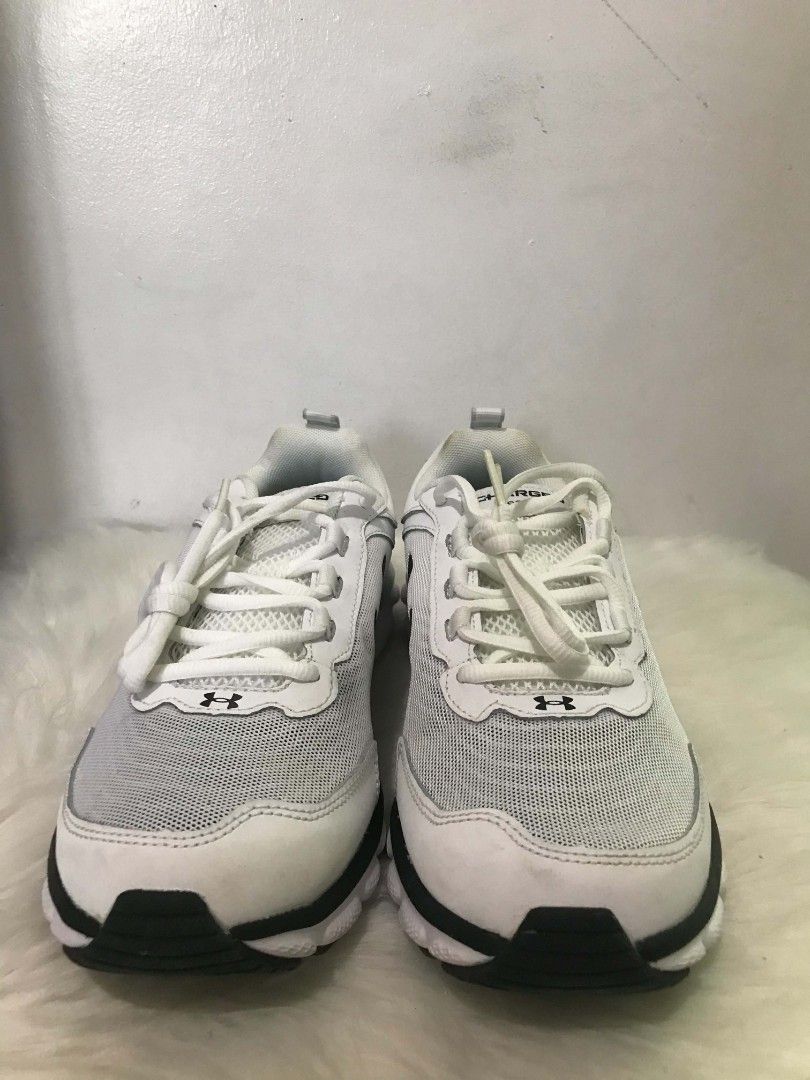 Under Armour Charged Assert 9 Men's Running Shoes White (Category: Sneakers) located in Manila. Submitted by vincent.seller (Listing ID 1463621142, Image 1). Description: - Brand: Under Armour - Model: Charged Assert 9 - Type: Running Shoes - Color: White with Black Accents - Size: 9.5 US Men's - Ideal for: Training or everyday wear - Features: Comfortable and supportive - Includes: Original box.