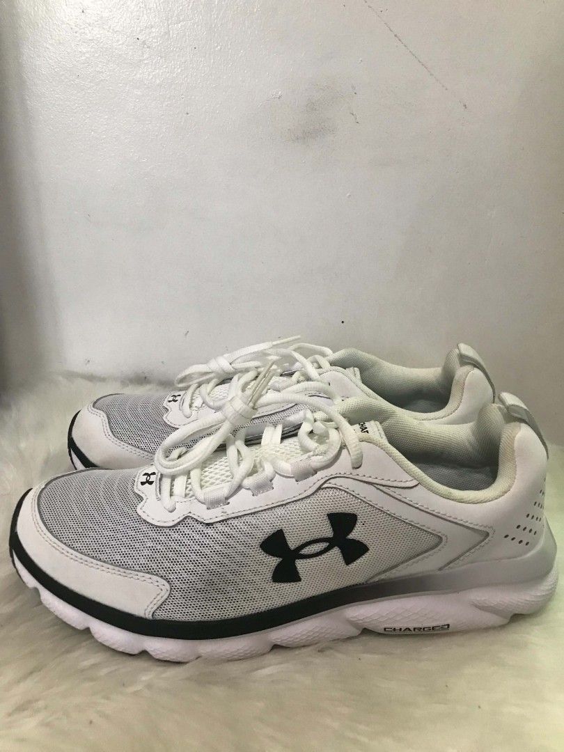 Under Armour Charged Assert 9 Men's Running Shoes White (Category: Sneakers) located in Manila. Submitted by vincent.seller (Listing ID 1463621142, Image 2). Description: - Brand: Under Armour - Model: Charged Assert 9 - Type: Running Shoes - Color: White with Black Accents - Size: 9.5 US Men's - Ideal for: Training or everyday wear - Features: Comfortable and supportive - Includes: Original box.