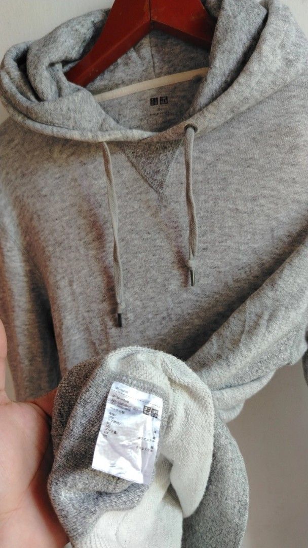 Uniqlo Grey Hoodie (Category: Hoodies) located in Cavite. Submitted by ukaynglahat (Listing ID 1463626340, Image 2). Description: - Classic grey Uniqlo hoodie - Soft and comfortable fabric - Features a front pocket - Adjustable drawstring hood - Versatile for everyday casual wear.