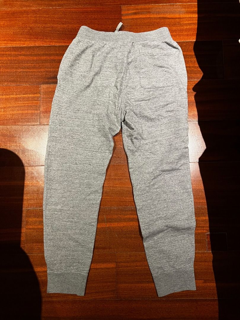 Uniqlo Grey Sweatpants | M (Category: Joggers) located in Caloocan City. Submitted by gabekristof (Listing ID 1463592787, Image 2). Description: Grey sweatpants with a drawstring waist and cuffed hems. Size: M (as labelled). Pre-loved and in good condition. No tears or stains. Price is fixed. Delivery via LBC, J&T or Lalamove. Meetup near DLSU along Taft Avenue can be arranged..