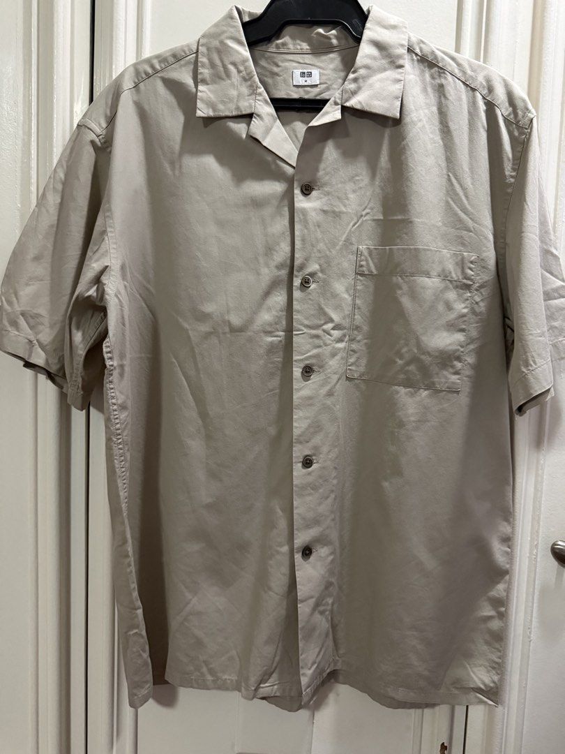 Uniqlo khaki Button down polo (Category: Formal Shirts) located in Muntinlupa City. Submitted by itsprelovednow (Listing ID 1463686080, Image 2). Description: L 28" W 22".