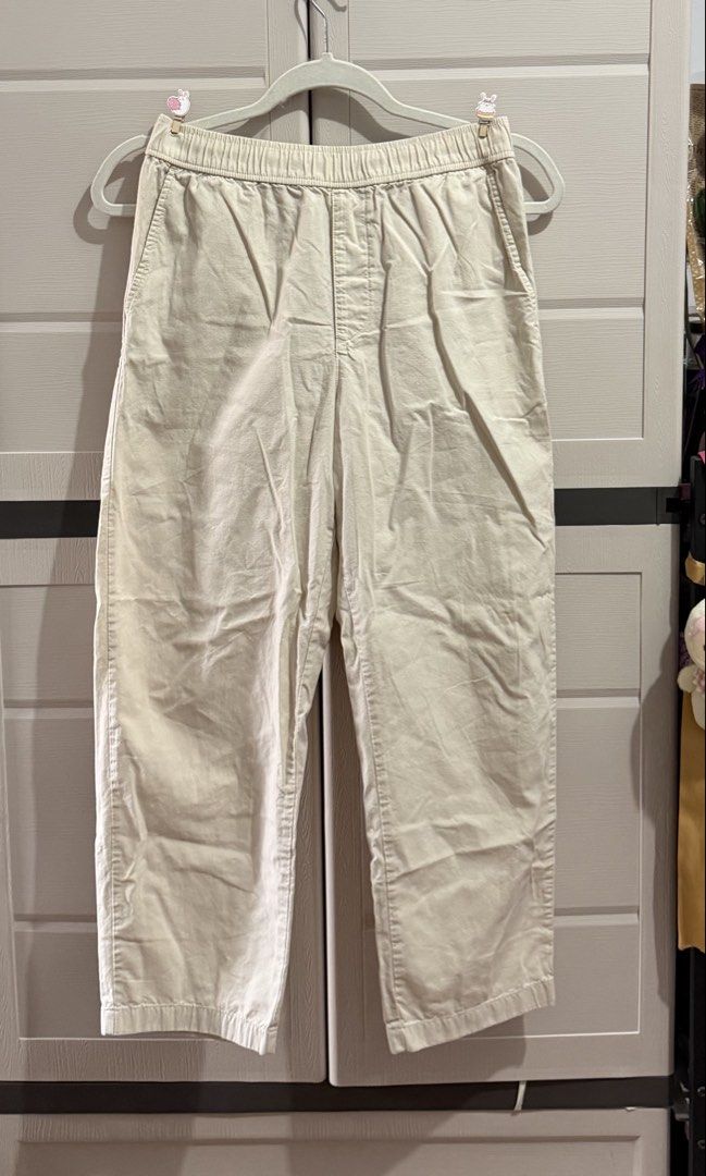 Uniqlo Medium Smart Ankle Pants (Category: Jeans) located in Imus. Submitted by ann.declutters22 (Listing ID 1463601101, Image 1). Description: - Cream colored pants - Elastic waistband for comfort - Straight leg cut - Side pockets - Comfortable and casual style - Ideal for everyday wear, lounging, or running errands - Versatile, easy to pair with different tops.
