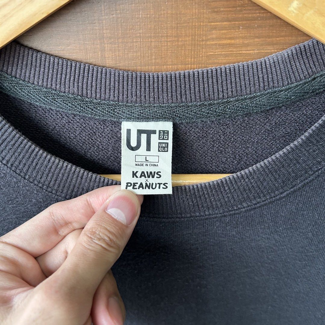 Uniqlo Snoopy x Kaws Patch Sweatshirt (Category: Coats, Jackets and Outerwear) located in Dagupan City. Submitted by macavex (Listing ID 1463645886, Image 3). Description: L on tag 21” x 25” 9/10 color rate Unnoticeable stain*.