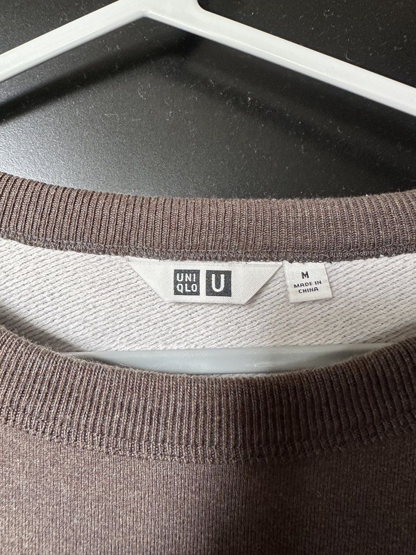 Uniqlo U Sweatshirt Brown Size M (Category: Longsleeves) located in Paranaque City. Submitted by _tonkatsuclub (Listing ID 1463625924, Image 3). Description: - Uniqlo U Crewneck Sweatshirt - Color: Brown - Size: Medium (M) - Style: Long sleeves, crew neckline - Features: Ribbed cuffs and hem - Material: Soft cotton blend - Versatile: Great for layering or wearing solo - Occasion: Ideal for casual outfits.