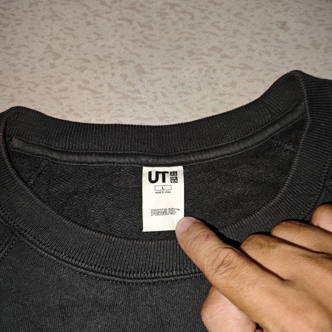 UNIQLO x Peanuts Crewneck Sweater (Category: Coats, Jackets and Outerwear) located in Tanay. Submitted by polothriftedit (Listing ID 1463604468, Image 3). Description: no issue excellent condition color rate: 10/10 no loose stitches, no distressing dimes: width: 23.5" length: 27.5" no return, no exchange, no refund [ pwede tumawad kahit walang kasalanan ].