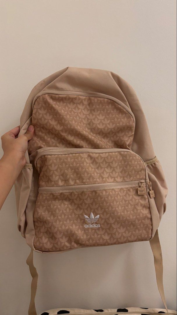 Unisex Beige Adidas Backpack (Category: Backpacks) located in Pasig City. Submitted by km.sc (Listing ID 1463667099, Image 1). Description: Brand new with tag Price: Negotiable .