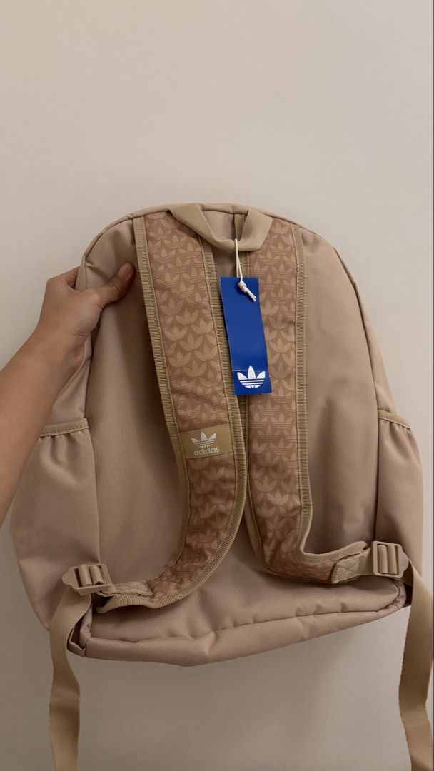 Unisex Beige Adidas Backpack (Category: Backpacks) located in Pasig City. Submitted by km.sc (Listing ID 1463667099, Image 2). Description: Brand new with tag Price: Negotiable .