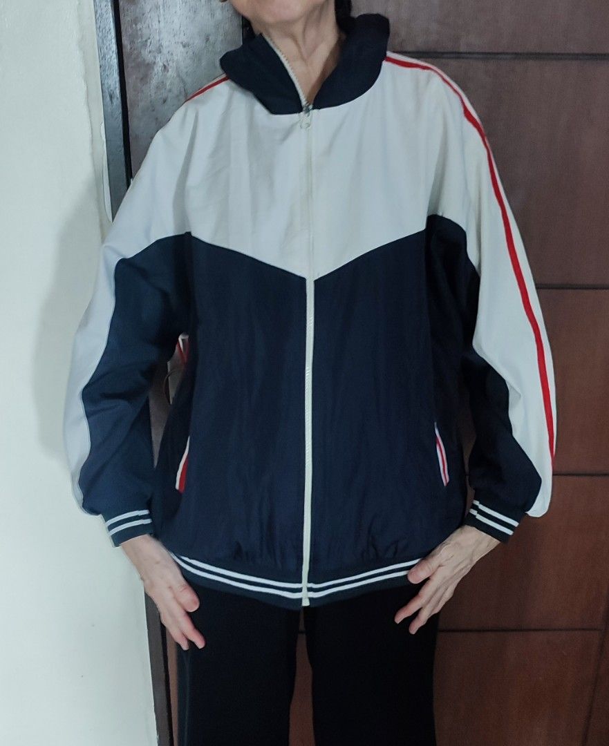 Unisex Colorblock Track Jacket (Category: Coats, Jackets and Outerwear) located in Quezon City. Submitted by rapstoreph (Listing ID 1463740980, Image 1). Description: - Stylish colorblock design: Navy blue, white, and red. - Functional zip-up front with a stand-up collar. - Comfortable ribbed cuffs and hem. - Versatile for casual wear or sports activities. - Easy to layer for different looks..