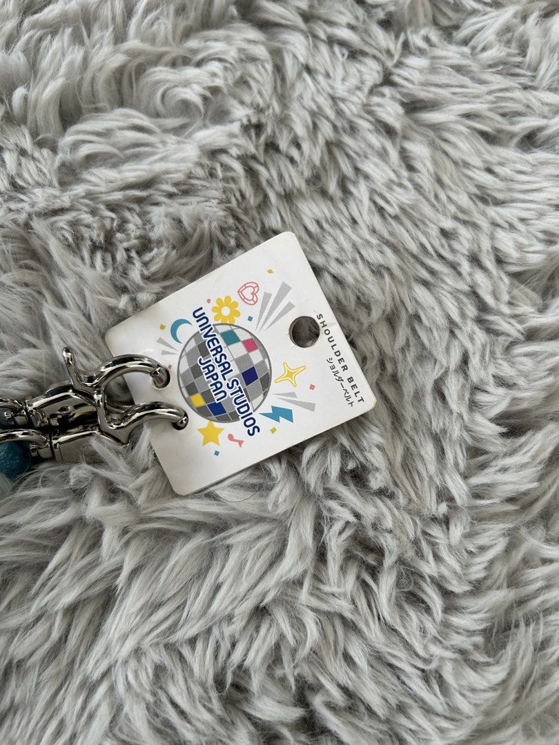 Universal Studios Japan Glitter Lanyard Shoulder Belt (Category: Luxury Accessories) located in Dasmarinas. Submitted by sfclosetcleanup (Listing ID 1463621260, Image 2). Description: - Authentic Glitter Lanyard from Universal Studios Japan - Features iconic park logo and 'Universal Studios Japan' text - Includes a convenient shoulder belt attachment - Comes with original tags attached - Ideal for securely carrying park passes, ID, or keys - A fu