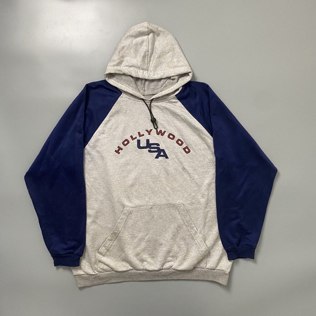 UNTAG 🏃‍♀️| Two-Tone Pull-Over Hoodie (Category: Hoodies) located in Bulacan. Submitted by orc.ph (Listing ID 1463660744, Image 1). Description: UNTAG 🏃‍♀️| Two-Tone Pull-Over Hoodie Material Used: Polyester -Blue / Gray -Loose Fit -“HOLLYWOOD USA” Spell-Out -Parachute Hood Drawchord -Kangaroo Pouch -Casual -Active Wear -Streetwear ‎-Size: XL -Width: 24” ‎-Length: 27” Used Condition. Minir Visible Flaws. Issue: Un/Washable Stains ‎ ‎⚠️Note: For
