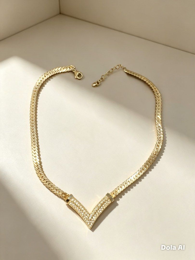 V necklace (Category: Necklaces) located in Manila. Submitted by keedidooplayhouse (Listing ID 1463621382, Image 1). Description: Inspired by LV and used some but faded but nice stone .