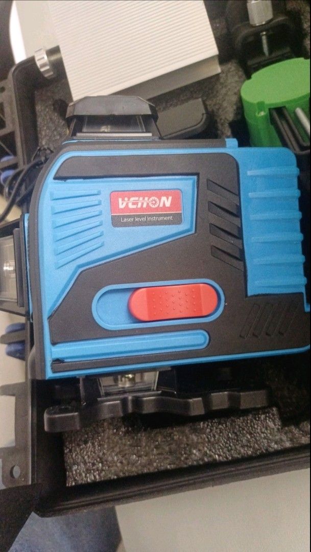 VECHON Laser Level Instrument (Category: Construction Tools & Equipment) located in Quezon City. Submitted by and_reaaaa11 (Listing ID 1463565074, Image 1). Description: - VECHON Laser Level Instrument - Includes protective case with foam padding - Features a red slider switch on the front - Ideal for construction and DIY projects - Ready for immediate use.