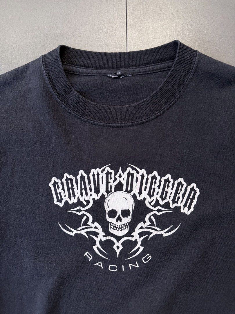 Vintage 00s Grave Digger Racing longsleeve (Category: Tshirts & Polo Shirts ) located in Santa Rosa. Submitted by arvintage.ph (Listing ID 1463696426, Image 2). Description: Tagged: Cut tag, fits small Width 17” | Length 23” | Sleeve 18” Condition: Vintage condition Issue(s): Small hole and sunfade. see photos.