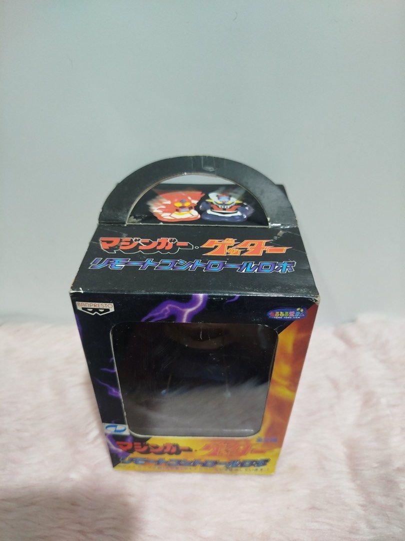 Vintage 1999 Mazinger Z Wired Remote Control Robot (Category: Remote Control Toys) located in Santa Rosa. Submitted by toysandusbmg (Listing ID 1463604051, Image 2). Description: Vintage 1999 Mazinger Z Wired Remote Control Robot - Item from Japan - Acceptable condition - Untested - Best for collector or display item - Please see pictures for details, this is the actual item for sale. Location: C.