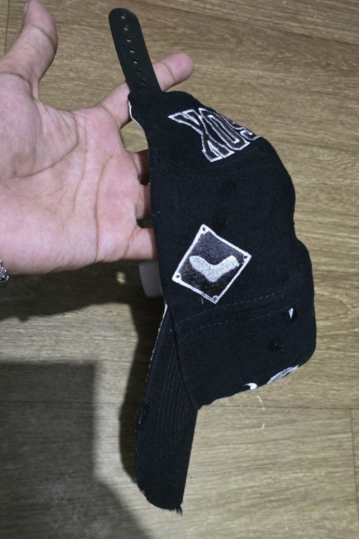 Vintage Black Chicago White Sox Snapback Cap (Category: Caps & Hats) located in Quezon. Submitted by archivesss_666 (Listing ID 1463674193, Image 2). Description: - Black snapback cap - Features white Chicago White Sox logo - Adjustable strap at the back - Shows some wear and tear on brim and edges - Perfect for White Sox fans - One size fits most.