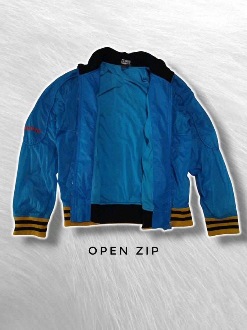 Vintage bomber jacket (Category: Coats, Jackets and Outerwear) located in Samal. Submitted by mltd_06 (Listing ID 1463741989, Image 3). Description: DOHC BOMBER JACKET - 90s VINTAGE 🔵🦅 DOHC = Double Overhead Camshaft - pang racing engine ng mga sports car. Nung 90s ginawang brand ng mga souvenir jackets sa Korea/Japan - parang VTEC - symbol ng bilis. • Size: 22x26 / L • Color: Royal Blue - Gold/Black ribbings • Details: Red Eagle + Flowers sa l