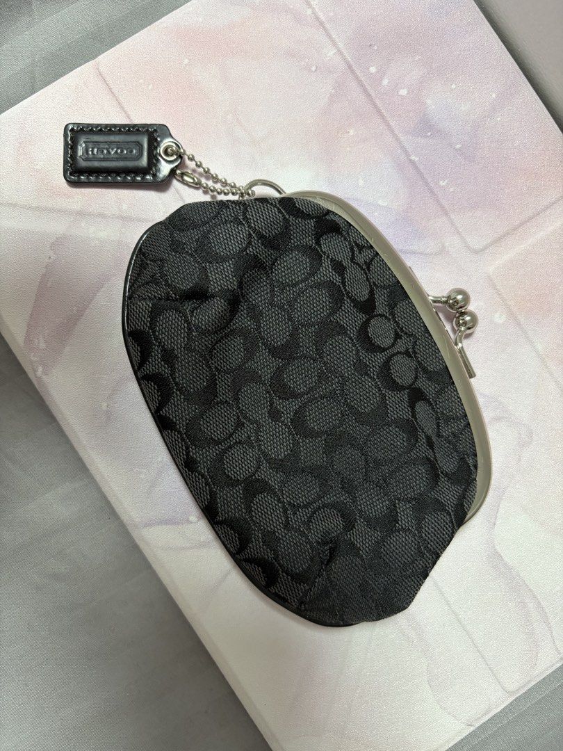 vintage coach kisslock wallet (Category: Wallets & Card holders) located in Pila. Submitted by raydltre (Listing ID 1463727046, Image 3). Description: - Authentic vintage Coach wallet - Classic black monogram canvas - Secure kisslock closure - Compact and stylish design - Perfect for essential.