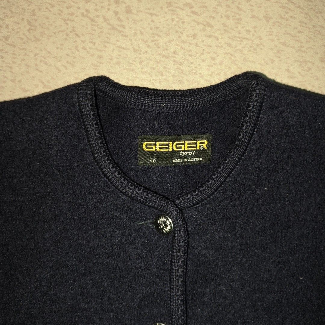 Vintage Geiger 100% Wool Cardigan (Category: Coats, Jackets and Outerwear) located in Tanay. Submitted by polothriftedit (Listing ID 1463606128, Image 2). Description: Issue: two small holes sa may sleeve Still in excellent condition Color rate: 10/10 Complete buttons No loose stitches, no distressing dimes: width: 20" length: 24" no return, no exchange, no refund [ pwede tumawad kahit walang kasalanan ].