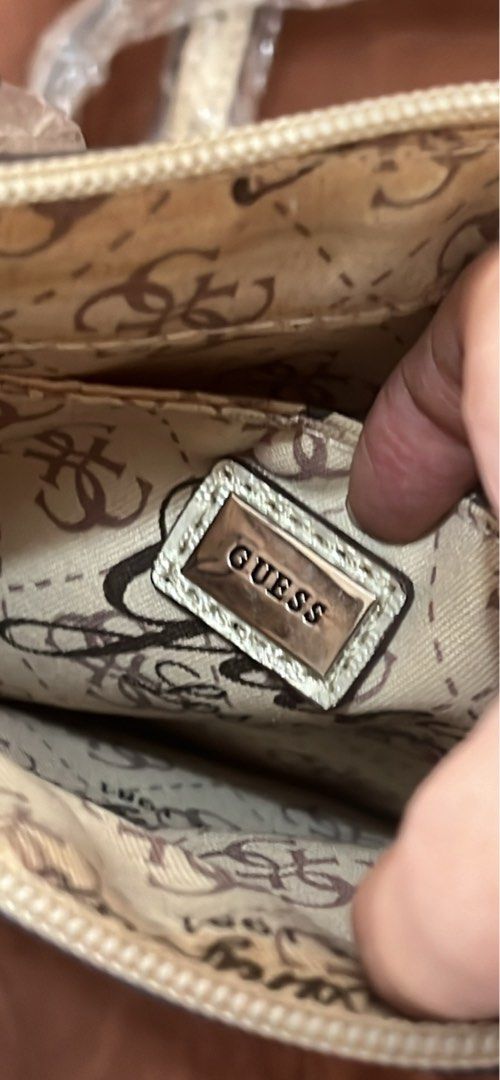 Vintage Guess Bag (Category: Cross-body Bags) located in Manila. Submitted by petitediva (Listing ID 1463574816, Image 3). Description: vintage GUESS cross body bag silver color all good condition no defect.
