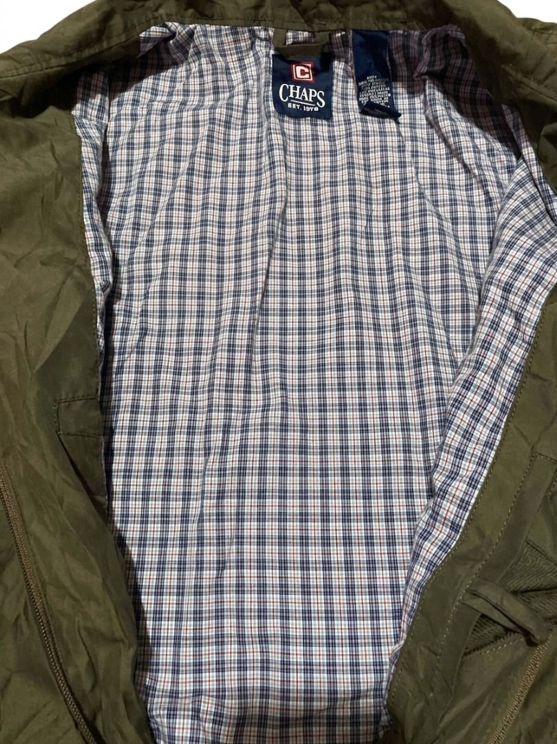 VINTAGE HARRINGTON Chaps Olive Green Zip-Up Jacket (Category: Coats, Jackets and Outerwear) located in Pasay City. Submitted by ken_98 (Listing ID 1463589852, Image 2). Description: - Olive green Chaps jacket - Zip-up front with collared neckline - Classic plaid pattern lining - Two front pockets with button closures - Button cuffs on sleeves - Ideal for layering w27.5 x L27.
