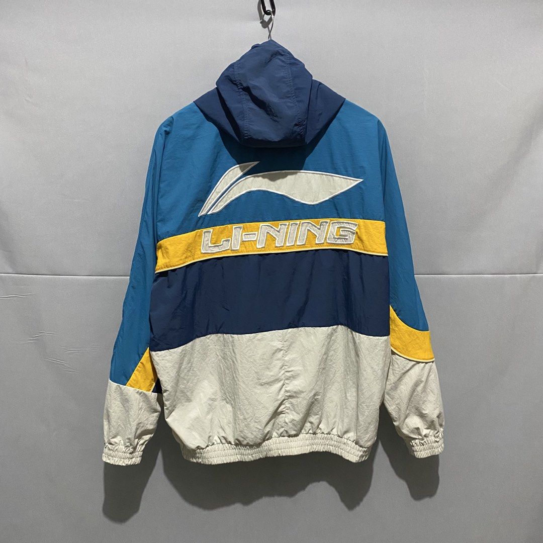 Vintage Li-ning jacket (Category: Coats, Jackets and Outerwear) located in Baguio. Submitted by loc_bc (Listing ID 1463716948, Image 3). Description: vintage Li-Ning tricolor half-zip windbreaker featuring a prominent front kangaroo pocket with a Chinese character patch.