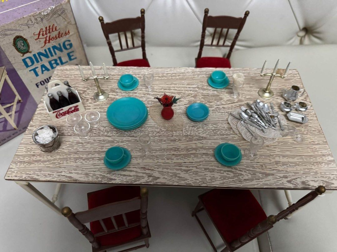 Vintage Marx Little Hostess Dining Table & 4 Chairs Set (Category: Kids Toys) located in Cainta. Submitted by elainelawenko (Listing ID 1463662890, Image 3). Description: - Vintage Marx Little Hostess Dining Table and Four Chairs set - From the 1960s to early 1970s - Includes original box and tiny accessories (plates, Coca-Cola crate) - Note: One leg has been replaced and is not original - Table can no longer be disassembled - Selling Price: P1,0