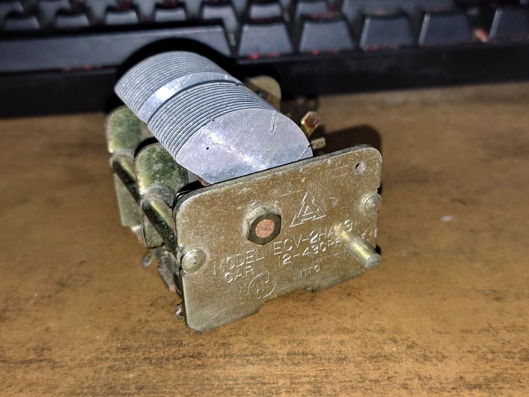 Vintage Nitto 12-430pF Air Variable Tuning Capacitor (Category: Electrical, Adaptors & Sockets) located in Paranaque City. Submitted by marvin.cavalida (Listing ID 1463720952, Image 1). Description: Model ECV-2HA43 by Nitto Of Japan Variable capacitors for tuning vintage HAM and AM/FM radio electronics. Turning the shaft adjusts how much the metal plates mesh together, changing the capacitance (12-430pF) to tune into different radio frequencies. 