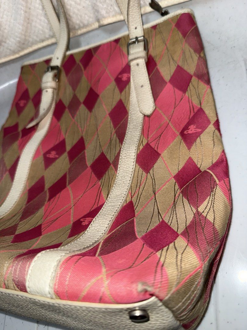 Vivienne Westwood (Category: Luxury Bags & Wallets) located in Manila. Submitted by jm_jm88 (Listing ID 1463603877, Image 3). Description: Measurement 34cm x 37cm.