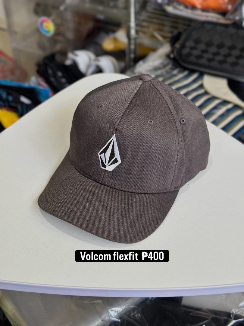 Volcom Flexfit Cap Grey S-M (Category: Caps & Hats) located in Daet. Submitted by thrifthings2018 (Listing ID 1463576154, Image 1). Description: - Grey Volcom Cap - Flexfit Style - Size: S-M - Material: Polyester and Cotton Blend - Perfect for Everyday Wear.
