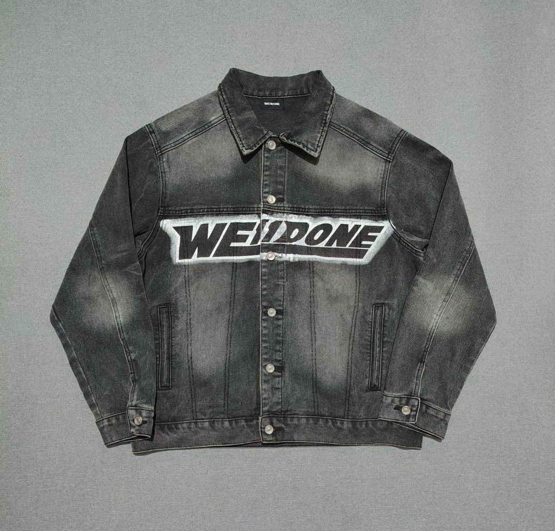 WE11DONE Washed Denim Jacket (White & Gray Spray Paint Logo) (Category: Coats, Jackets and Outerwear) located in Taguig. Submitted by _theroom.ph (Listing ID 1463683162, Image 2). Description: - WE11DONE black washed denim jacket - Features signature brand logo on chest - Button-up front with classic collar - Versatile styling with jeans or trousers - A cool statement piece for your wardrobe WE11DONE Washed Denim Jacket (White & Gray Spray Paint 
