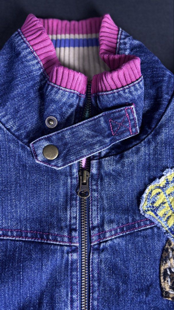 Weekend Workshop Denim Jacket M (Category: Coats, Jackets and Outerwear) located in Bacoor. Submitted by calvinmanzano13 (Listing ID 1463625570, Image 3). Description: - L = 22” | W = 19” - Unique design with fun patches and a leopard print heart - Pink and blue striped cuffs and collar for a pop of color - Zipper closure for easy wear - Ideal for creating a stylish casual outfit Notes: ☑️ Hand washed ☑️ Polished ☑️ Steam ironed.