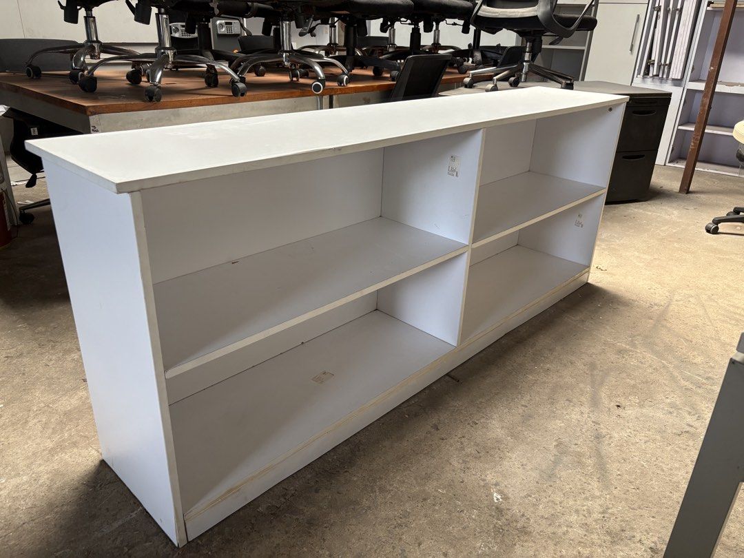 White 4-Tier Bookshelf Storage Shelf (Category: Shelves, Cabinets & Racks) located in Valenzuela. Submitted by cha_leng.861 (Listing ID 1463585821, Image 1). Description: - White 4-tier bookshelf - Four open compartments - Ideal for books, display items, or general organization - Simple and functional design - Approximate dimensions: 120cm (Length) x 60cm (Height) - Pick up only.
