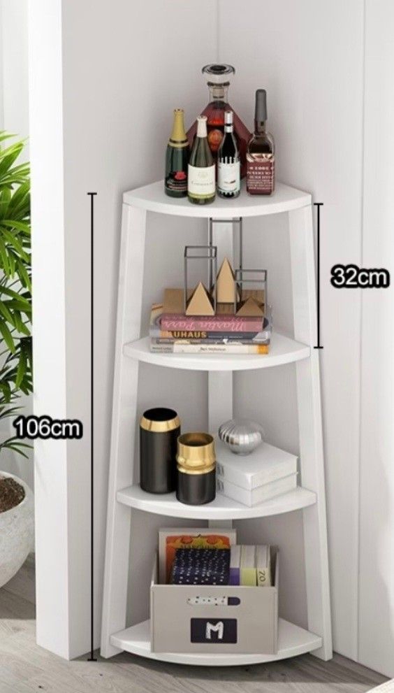 White 4-Tier Ladder Corner Shelf Bookshelf Display Stand Solid Wood (Category: Shelves, Cabinets & Racks) located in Manila. Submitted by phoebecali (Listing ID 1463587045, Image 2). Description: - White 4-tier corner shelf - Ladder style design - Ideal for displaying books, plants, or decor - Dimensions: 106cm tall, approx. 32cm shelf depth - Space-saving design, fits neatly into any corner - Easy to assemble - Versatile use for living room, bed