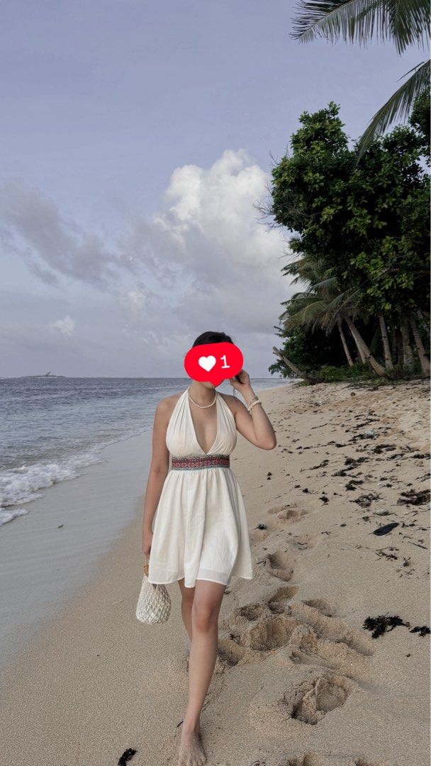 White beach dress (Category: Dresses) located in Manila. Submitted by baeeeeee (Listing ID 1463660718, Image 1). Description: Used twice as seen on the pics.