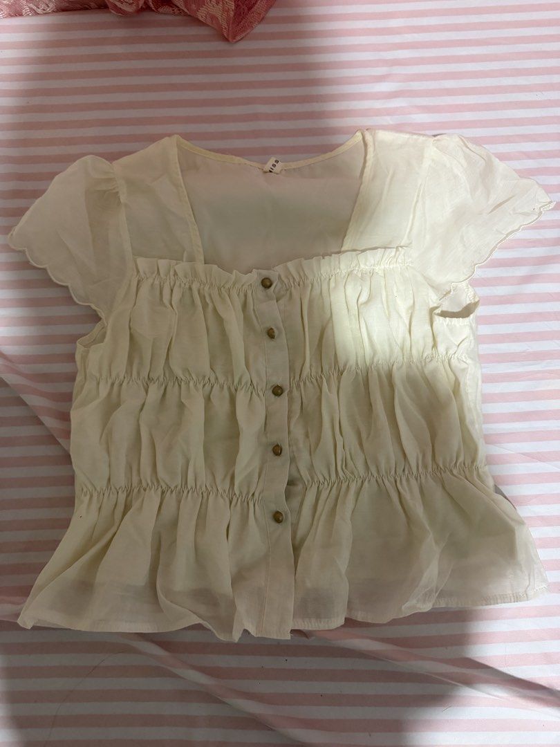 white button up blouse (Category: Blouses) located in Manila. Submitted by ytsyrk (Listing ID 1463650442, Image 1). Description: cute white button up blouse i thrifted but i started to change aesthetic so i barely used it! .