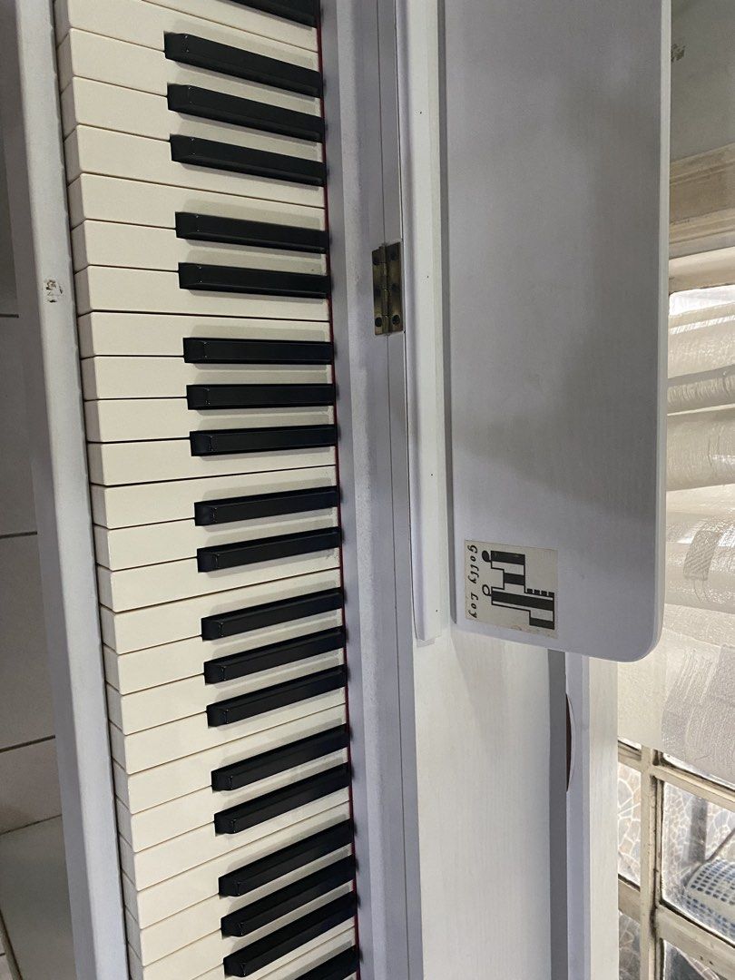 White Digital Piano with Pedals and USB (Category: Musical Instruments) located in Pasig City. Submitted by ayi017 (Listing ID 1463605407, Image 3). Description: - White 88-key digital piano - Includes three pedals - USB connectivity for recording and playback - Rhythm and tone functions included - Ideal for learning or practice - Selling as is.