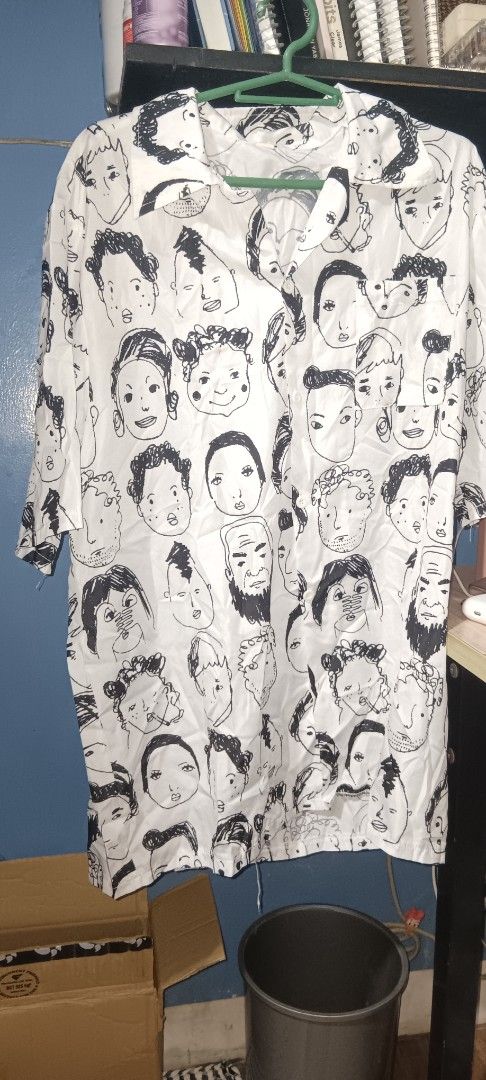 White Shirt with Black Face Print (Category: Shirts) located in Quezon City. Submitted by piptea (Listing ID 1463717303, Image 1). Description: - fits s-l - white button shirt with a doodled faces - lightweight fabric good for casual everyday wear. - cute when paired with mom jeans and sandals - has stains near the pockets not sure from what - rfs: i dont wear it anymore.
