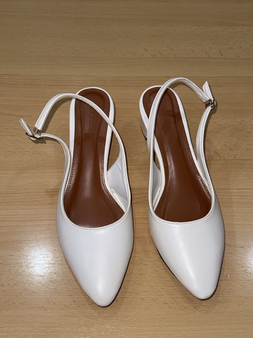 White Slingback Heels with Buckle Strap (Category: Heels) located in Muntinlupa City. Submitted by diananeedsspace (Listing ID 1463609725, Image 2). Description: - White pointed-toe slingback heels - Low block heel for comfort - Adjustable ankle strap with buckle - Tan brown inner sole - Size: 41 - Versatile: dress up or down Can fit EU 40 or US 9 (this is my size). Used once only..