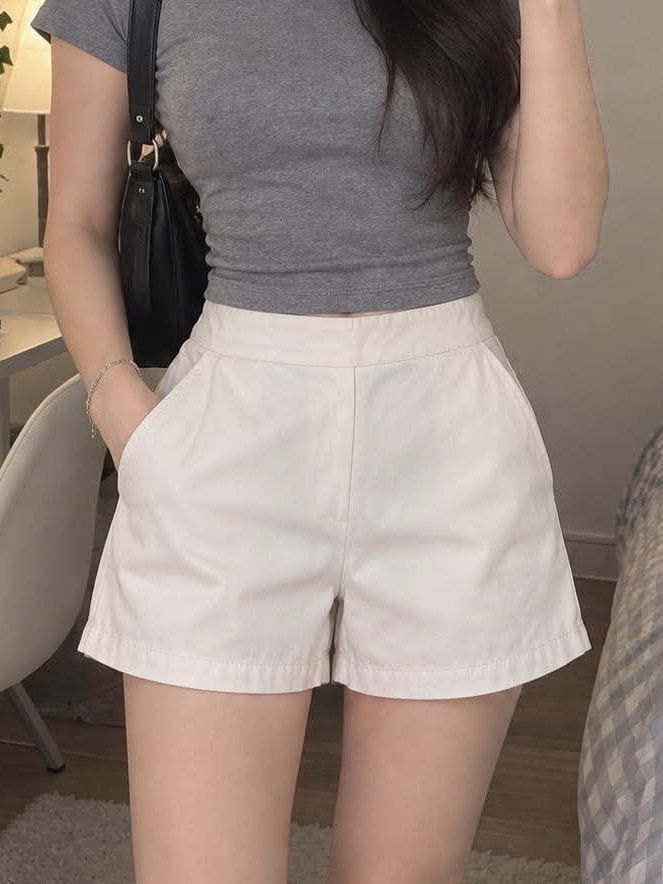White tailored women's shorts (Category: Shorts) located in Manila. Submitted by _auraq11 (Listing ID 1463190725, Image 1). Description: 16 inch long 11-12 inch waist.