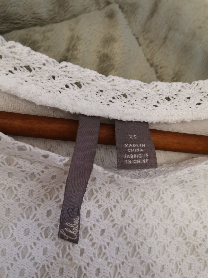 White top (Category: Shirts) located in Quezon City. Submitted by closetnikikay (Listing ID 1463691547, Image 2). Description: .