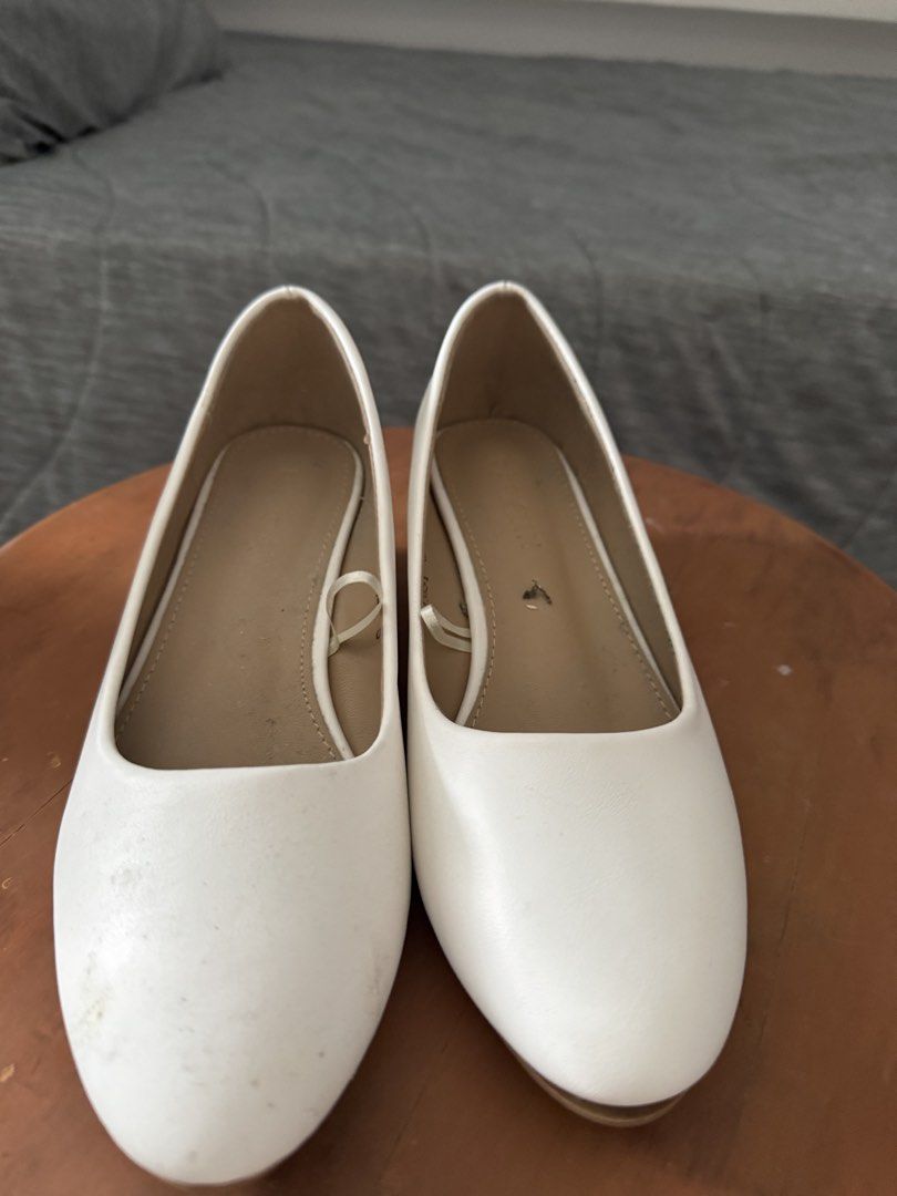 White Wedge Heels Size 5 (Category: Wedges) located in Las Pinas. Submitted by megalleon8 (Listing ID 1463684429, Image 1). Description: - Brand: Whimsy - Style: White Wedge Heels - Size: 5 - Type: Slip-on - Sole Color: Brown - Condition: Like new, price tag still attached, minimal signs of wear. - 1x lang ginamit, nakalimutan tanggalin yung tag price 😄 - Need idikit yung front part ng soles.