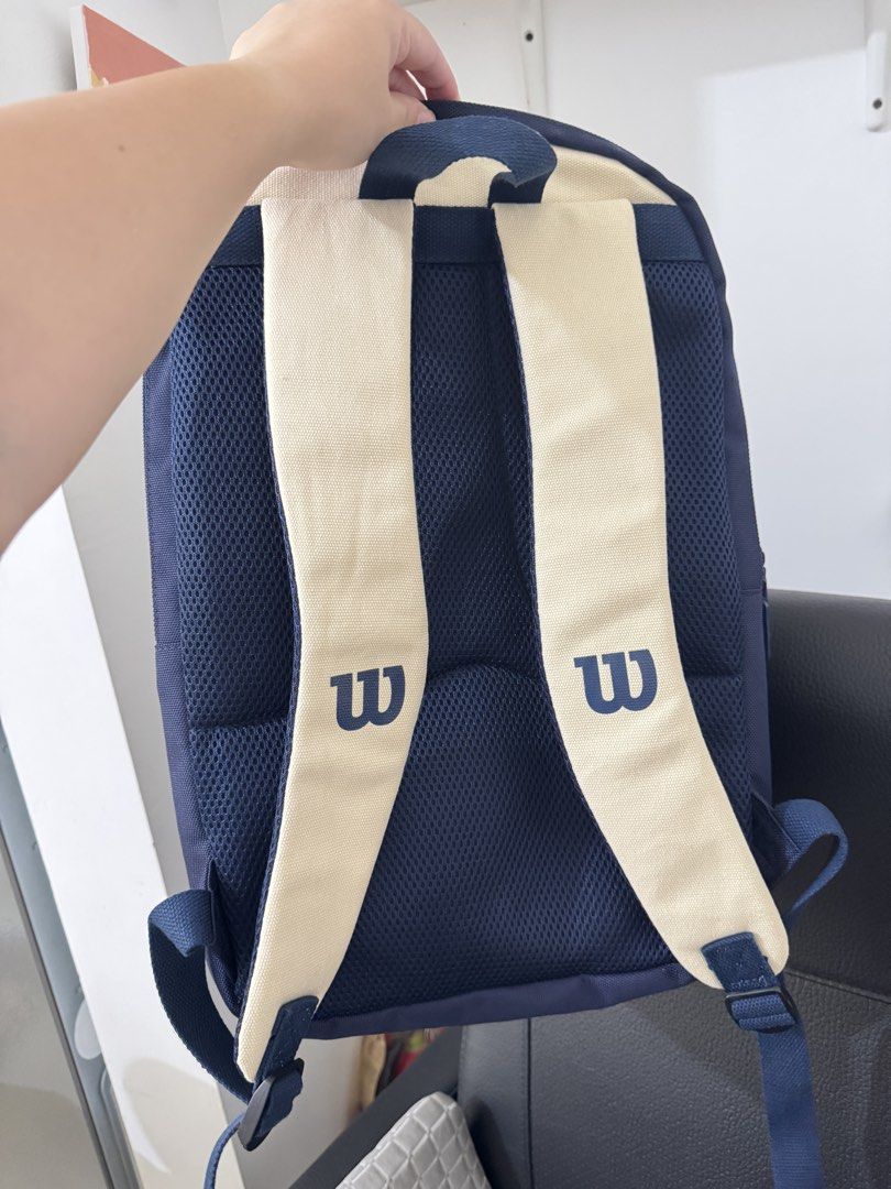 Wilson Teddy Bear Backpack Navy Blue (Category: Backpacks) located in Pasay City. Submitted by decluttering_mom_2026 (Listing ID 1463641750, Image 2). Description: - Cute Wilson backpack with adorable teddy bear graphic - Stylish navy blue and cream colorway - Adjustable straps for a comfortable fit - Multiple zipped compartments for secure storage - Has a compartment for racket.