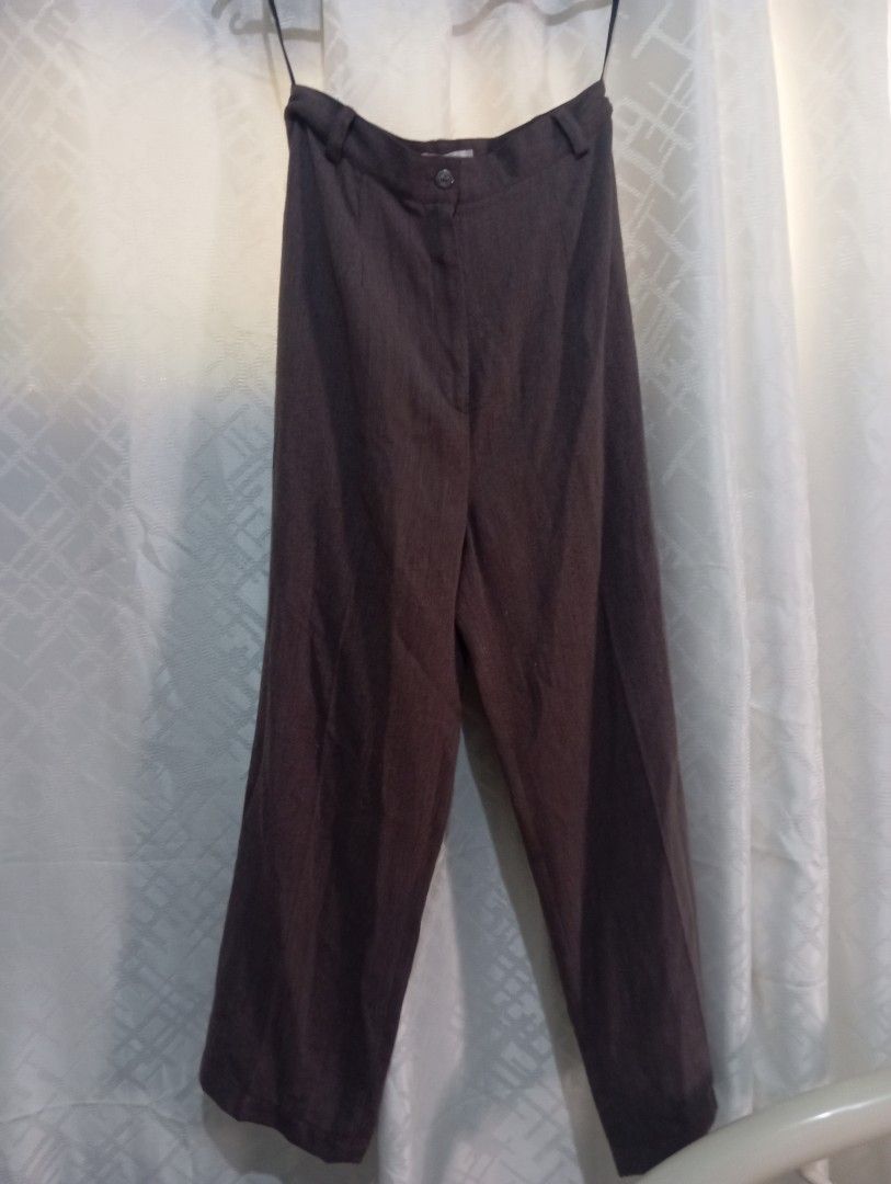 Women's Slacks (Category: Other Bottoms) located in Dasmarinas. Submitted by kei05 (Listing ID 1463565888, Image 2). Description: - Classic women's dress pants - Dark brown color (wool blend look) - Straight leg cut - Two-button waist closure - Two front pockets - Versatile for work, formal occasions, or smart casual outfits waistline 26 inches length 36 inches.