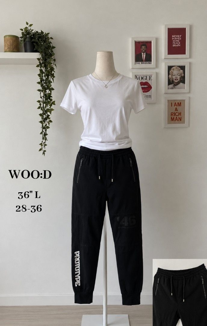 WOO:D Black Jogger Pants with Zipper Pockets (Category: Joggers) located in La Trinidad. Submitted by honeysplushies2 (Listing ID 1463663582, Image 1). Description: - Brand: WOO:D - Color: Black - Style: Jogger Pants - Size: 36" L (fits waist 28-36") - Features: Zippered side pockets, drawstring waist - Ideal for: Comfortable and stylish everyday wear.