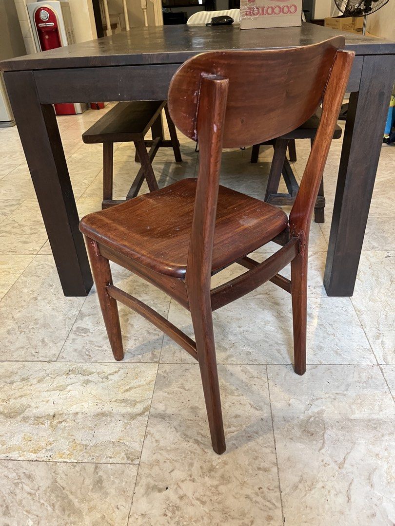 Wooden Dining Chair (Category: Chairs) located in Quezon. Submitted by vintage66 (Listing ID 1463648021, Image 2). Description: - Solid wood dining chair - Dark brown finish - Curved backrest for comfort - Sturdy legs - Perfect for dining or as an accent chair - Minor scuffs from normal use - Ready for a new home.