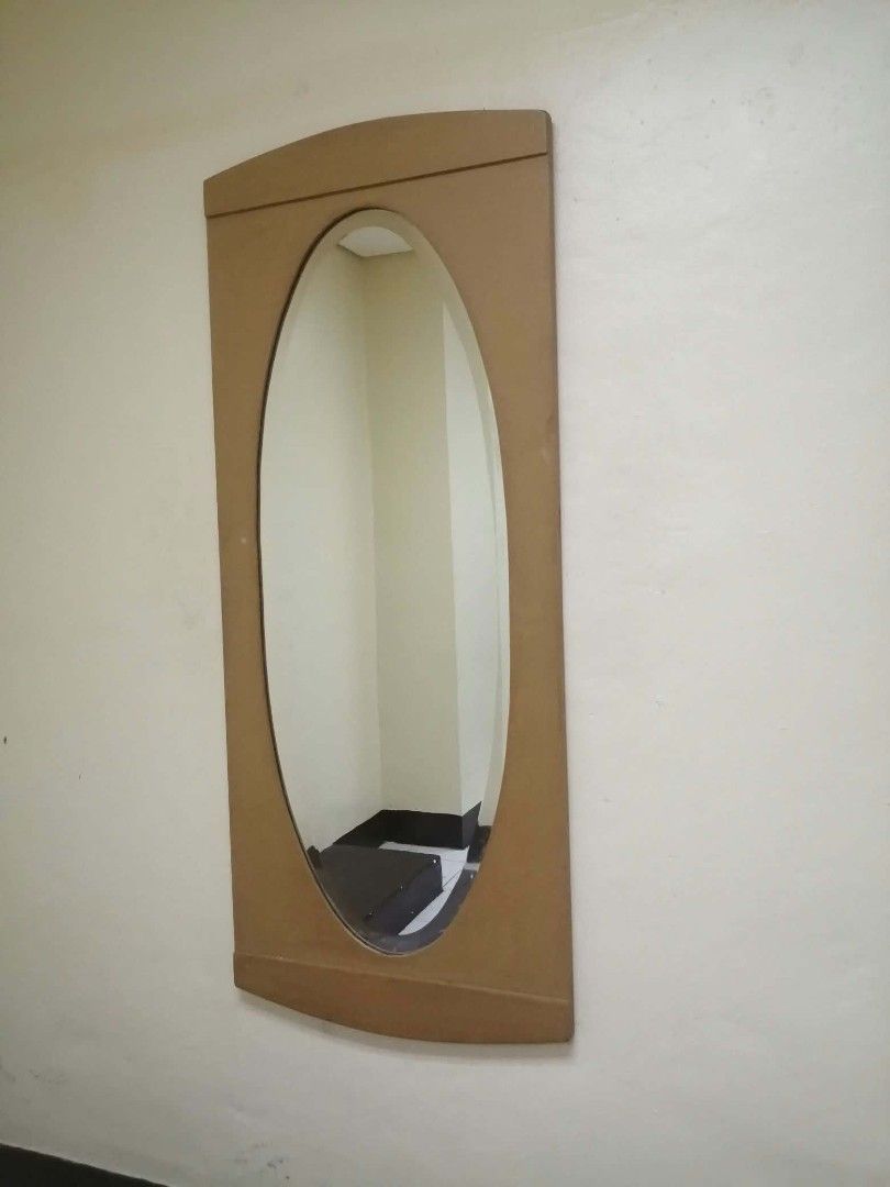 Wooden Framed Oval Mirror (Category: Mirrors) located in Las Pinas. Submitted by jesus1smysavi0r (Listing ID 1463642013, Image 1). Description: - Modern wooden frame with a simple design. - Elegant oval-shaped mirror. - Ideal size for hallways, entryways, or bedrooms. - Lightweight and easy to hang on any wall. - Adds a stylish touch to your home decor..